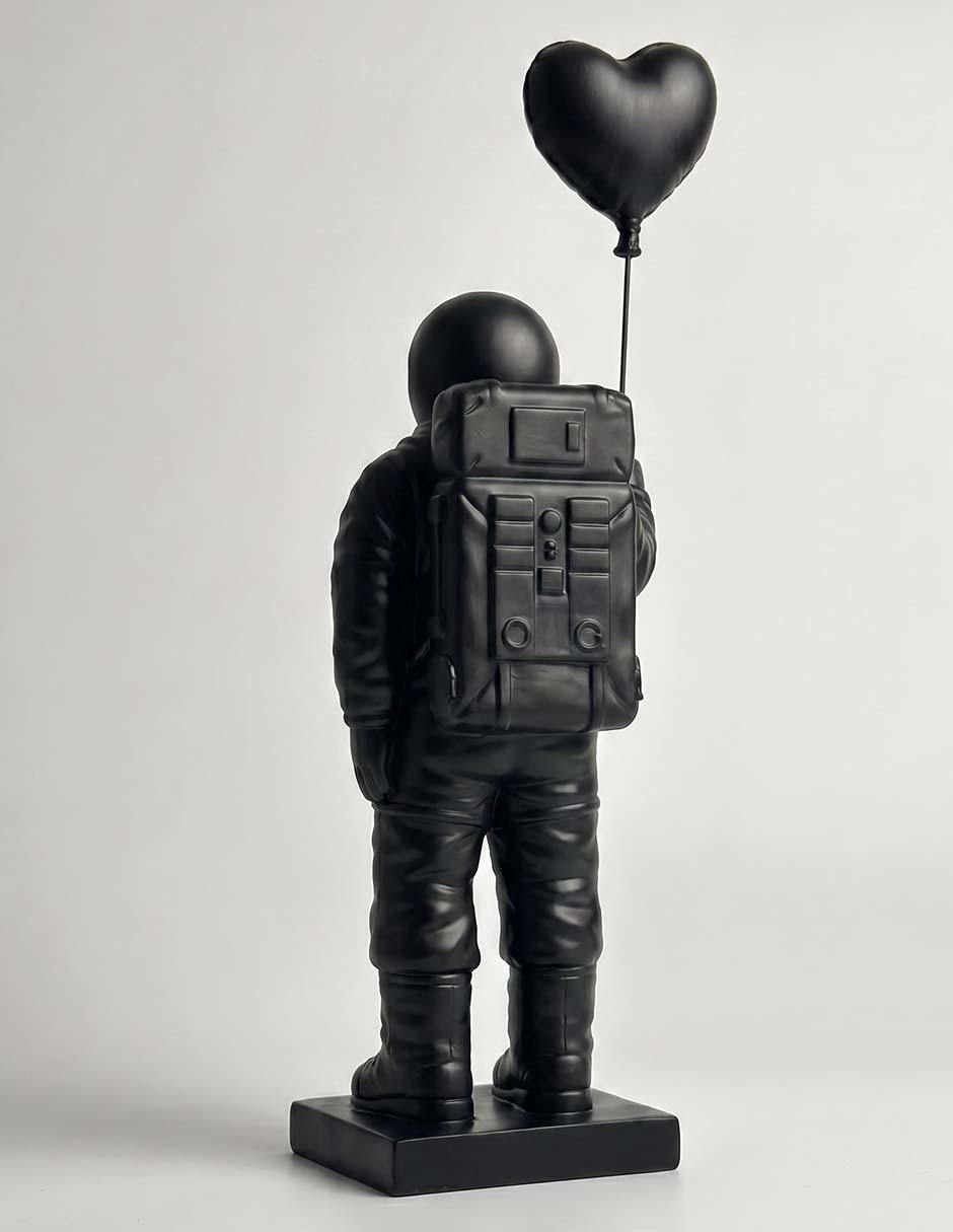 Figura decorativa de astronauta con corazón Haus de resina