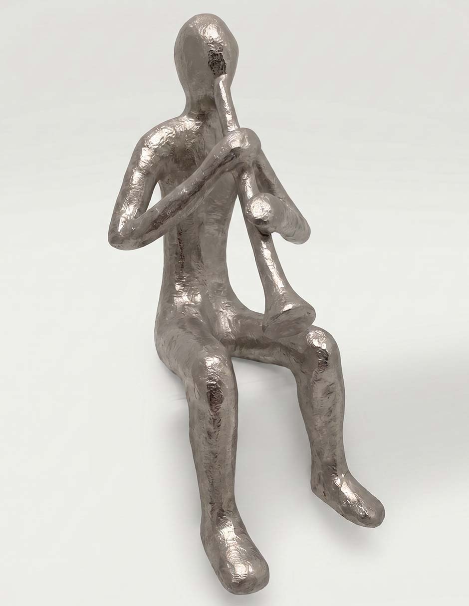 Figura decorativa de músico