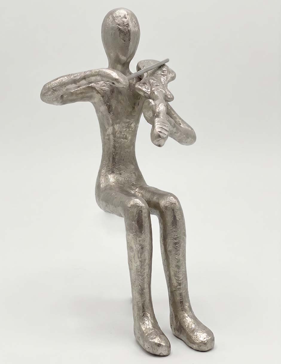 Figura decorativa de músico